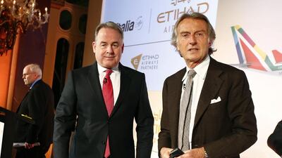 Etihad president and chief executive James Hogan, left, and Alitalia chairman Luca di Montezemolo in Rome during the announcement of their airlines’ partnership. Tony Gentile / Reuters