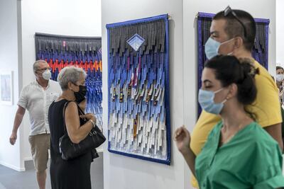 Visitors to Art Dubai 2021 at DIFC. Antonie Robertson / The National
