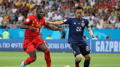 Japan's Maya Yoshida, right, in action with Belgium's Romelu Lukaku at the 2018 World Cup. Reuters