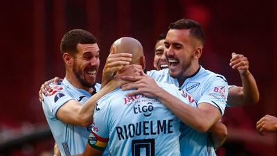 Club Bolivar's Marcos Riquelme celebrates with teammates after scoring against Lanus during the Copa Sudamericana match in Argentina on December 2, 2020. AFP