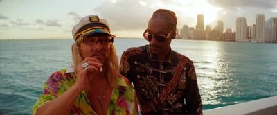 Matthew McConaughey, left, and Snoop Dogg in a scene from 'The Beach Bum'. Neon via AP