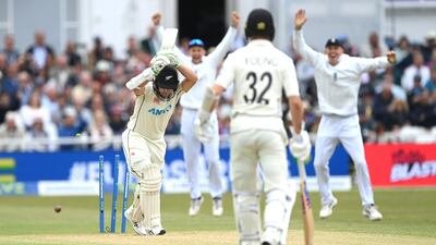 New Zealand batsman Tom Latham is bowled by James Anderson as the England great reaches 650 career Test wickets. Getty