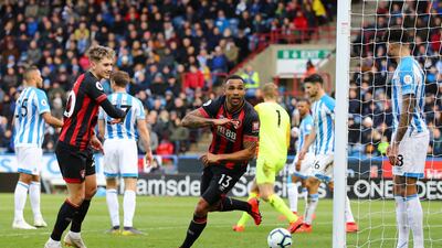 Callum Wilson celebrates after scoring the first goal in Bournemouth's 2-0 win at Huddersfield Town. Getty