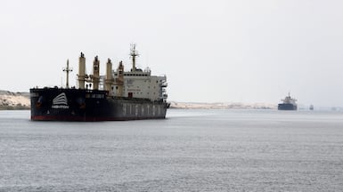 Ships move through the Suez Canal near Ismailia, Egypt. Reuters