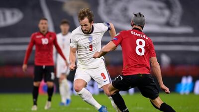 Harry Kane of England is challenged by Klaus Gjasula of Albania during their World Cup qualifier. Getty