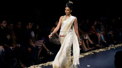 August 18, 2011: An Indian model displays designer Anita Dongre creations during the Lakme Fashion Week in Mumbai, India. AP Photo/Rajanish Kakade