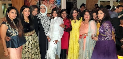 The writer, in yellow, at a Diwali party in Dubai. Photo: Panna Munyal