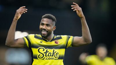 Watford's Emmanuel Dennis celebrates after Joshua King scored the opening goal. AP