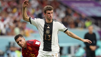 Germany's Thomas Muller controls the ball under pressure from Rodri. Getty