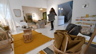 A shop in Tunis displays rugs made by the weavers in Nefta as part of the Shanti project.