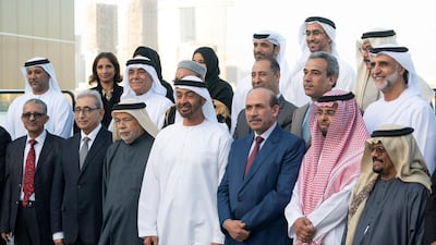 Sheikh Mohamed bin Zayed, Crown Prince of Abu Dhabi and Deputy Supreme Commander of the Armed Forces, stands for a photograph with members of Emirates Writers Union, during a Sea Palace barza. Mohamed Al Hammadi / Ministry of Presidential Affairs