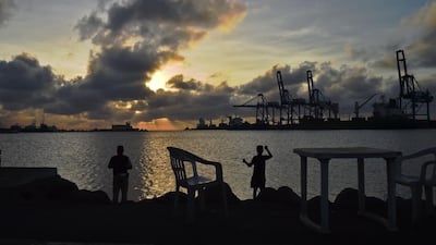 Boys fishing near Djibouti port on May 3, 2015 which has emerged as the only safe and efficient port in the troubled Horn of Africa. Carl de Souza/AFP Photo