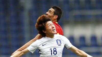 Spain’s Bruno Soriano and South Korea’s Hwang Ui-jo in action. Leonhard Foeger / Reuters