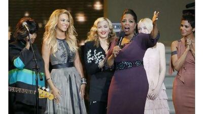 Surrounded by celebrity guests, Oprah Winfrey gestures during the taping last month of her "Farewell Spectacular". Millions around the world love her, but a letter-writer today offers a different opinion. Charles Rex Arbogast / AP