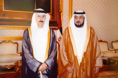 A photograph from 2016 of former president Sheikh Khalifa and Abdullah Mohammad Al Maainah, who designed the UAE flag. Christopher Pike / The National
