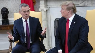 Jens Stoltenberg, the Nato Secretary General, left, speaks to US President Donald Trump in the Oval Office of the White House in Washington on Tuesday. Bloomberg