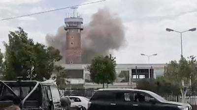 Smoke rises from the airport in Sanaa after the rebel-held capital was hit by air strikes. AFP