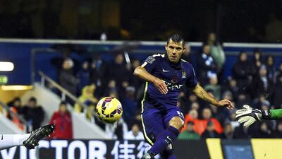 Manchester City's Sergio Aguero scores during the English Premier League match against Queens Park Rangers at Loftus Road in London on November 8, 2014. Dylan Martinez / Reuters
