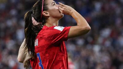 Alex Morgan of the United States celebrates after scoring a goal against England in Lyon late on Tuesday. Srdjan Suki / EPA