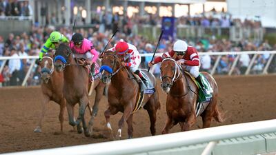Gun Runner (right) leads Collected (middle right) and West Coast (middle left) and War Story (left) to the finish line for the win in the Breeders' Cup Classic. The fact Arrogate was not in contention as his trainer Bob Baffert considering retirement for his charge. Jake Roth / USA Today