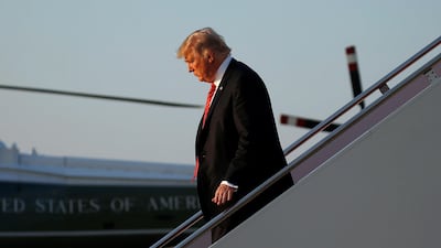 US president Donald Trump disembarks from Air Force One at Joint Base Andrews, Virginia, on August 23, 2017. Joshua Roberts / Reuters