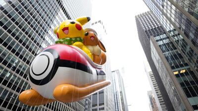 The Pikachu and Eevee balloons. AP