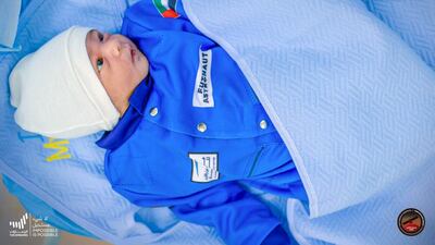 A newborn baby dons his own astronaut suit Astronauts of the future, born on Feb 9, 2021 - the day the UAE made it to Mars. Dubai media office twitter