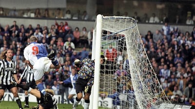 Alan Shearer scores forBlackburn agakinst Newcastle in 1995. Reuters