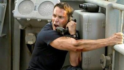 Taylor Kitsch as Lt Alex Hopper, a naval officer assigned to the USS John Paul Jones in a scene from the movie Battleship, opening in the UAE today.