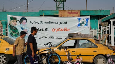 A banner calling for a boycott of Iraq's elections in Sadr City on the outskirts of Baghdad. AP