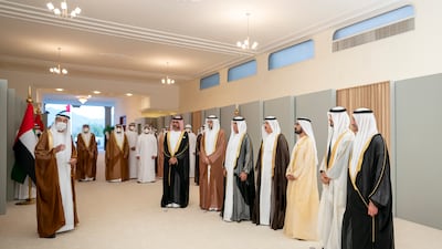 Pictured, from left, Sheikh Ammar bin Humaid Al Nuaimi, Crown Prince of Ajman, Sheikh Sultan bin Mohammed Al Qasimi, Crown Prince and Deputy Ruler of Sharjah, Sheikh Saud bin Saqr Al Qasimi, Ruler of Ras Al Khaimah, Sheikh Saud bin Rashid Al Mualla, Ruler of Umm Al Quwain, Sheikh Mohammed bin Rashid, Vice President and Ruler of Dubai, Sheikh Mohamed bin Zayed and Sheikh Hamad bin Mohammed Al Sharqi, along with Mr Balama. Mohamed Al Hammadi / Ministry of Presidential Affairs