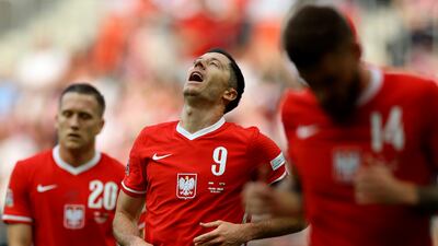 Poland's Robert Lewandowski reacts after a missed chance. AP