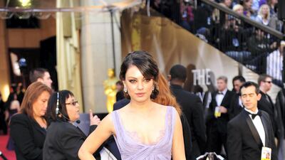2011: Mila Kunis wears Elie Saab to the 83rd Annual Academy Awards held in California on February 27, 2011. AFP