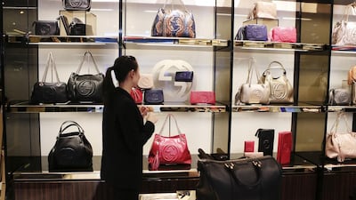 Real Gucci purses such as these at Dubai Duty Free are beyond the budget of some, but buying cheap fakes comes with its own price. Photo: Sarah Dea / The National