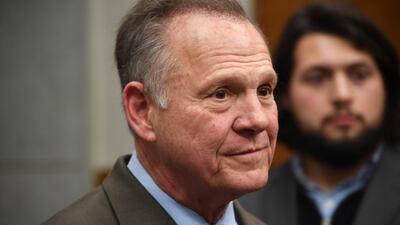 Republican senatorial candidate Roy Moore arrives at an election night party in Montgomery, Alabama, on December 12, 2017. AFP