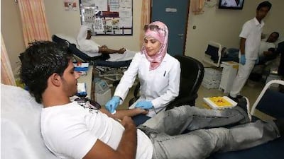 A man donates blood at the Blood Donation Centre in Al Wasl Hospital, Dubai.