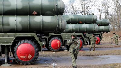 Russian servicemen stand next to a S-400 'surface-to-air missile system outside Gvardeysk near Kaliningrad, Russia March 11, 2019. Reuters