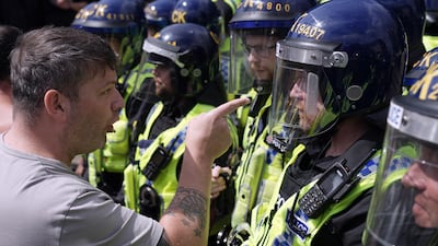 Police clash with right-wing protesters in Piccadilly Gardens, Manchester. Getty Images