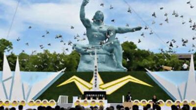 Doves fly around the monument at the Peace Park during the memorial ceremony for the A-bomb victims in Nagasaki. The Japanese city marked the 63th anniversary of the atomic bombing.