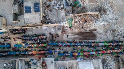 A mass iftar in the town of Atareb in the rebel-held countryside of Aleppo province, at the end of a fasting day during Ramadan. AFP