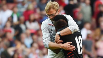 Liverpool manager Jurgen Klopp with Sadio Mane at the end of last week's win over Arsenal. Andy Rain / EPA / August 14, 2016