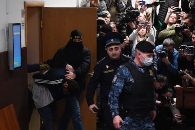 Four men have been remanded by a Moscow court on suspicion of carrying out the attack that killed 137 people. AFP
