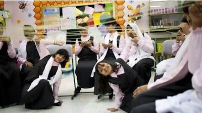 Students play an ice-breaker game at their first English class of the year at the Queeba Girls School in Ras Al Khaimah.