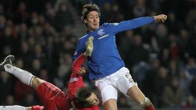 Former Rangers striker Francisco Sandaza, right, was terminated by the club after he made comments in a conversation with somebody who was purporting to be an agent. Lynne Cameron / PA
