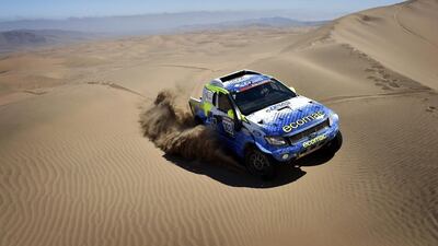 A handout picture made available by Atacama Rally shows Chilean driver Hernan Garces in action during the Atacama Rally 2015 in the Atacama Desert, some 600 kilometres from Santiago, Chile. Garces won the event in the cars category. Edoardo Bauer / EPA