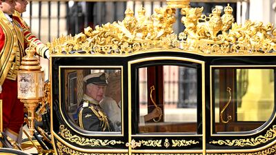 The king and queen leaving Buckingham Palace ahead of this year's State Opening of Parliament. Getty Images