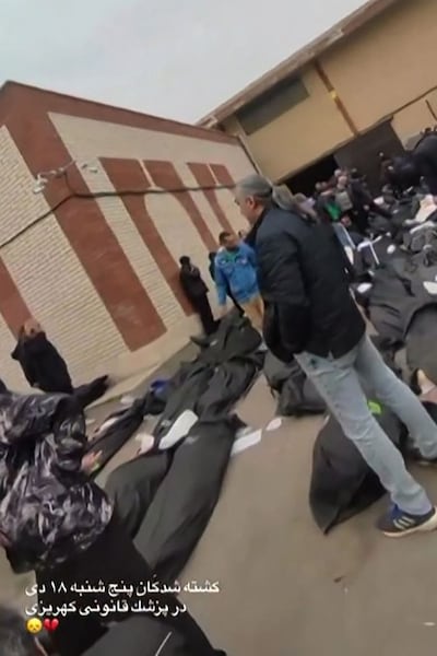 A screengrab of a video shows rows of bodies in body bags, as protests rage across Iran. AFP