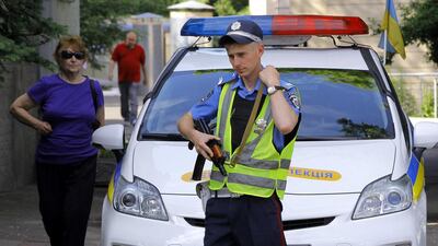 Ukrainian armed police guard a polling station during the presidential elections in central Kiev, Ukraine, 25 May 2014. The government in Kiev has vowed that the vote will go ahead in all parts of the country, including Crimea, which was annexed by Russia after a controversial referendum in March. Robert Ghement/EPA