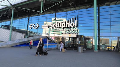 A man suspected to be part of a gang accused of orchestrating a string of killings was arrested at Amsterdam's Schiphol airport following his deportation from Dubai.