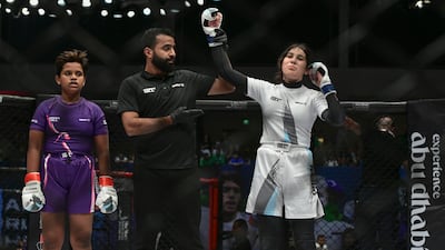 UAE's Aisha Al Hammadi defeated India's Mahi Dongre on the opening day for IMMAF Youth World Championships at the Mubadala Arena in Abu Dhabi. All photos Khushnum Bhandari / The National